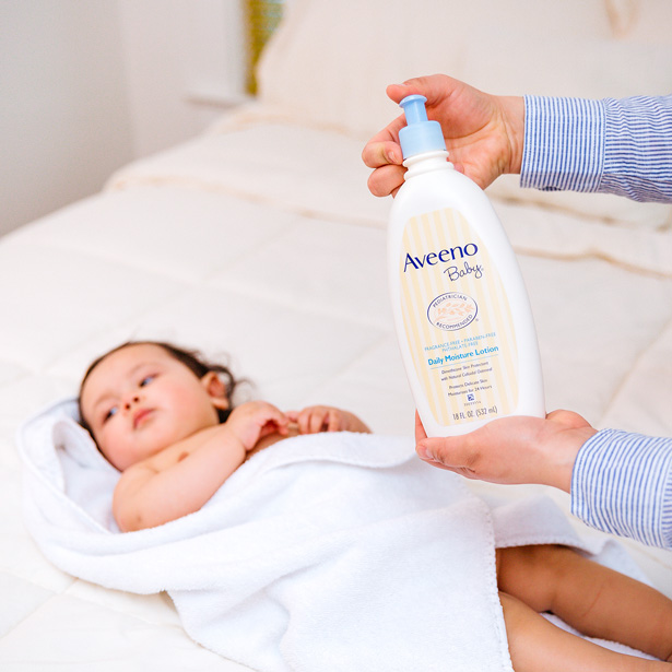 baby with aveeno daily moisturizing lotion